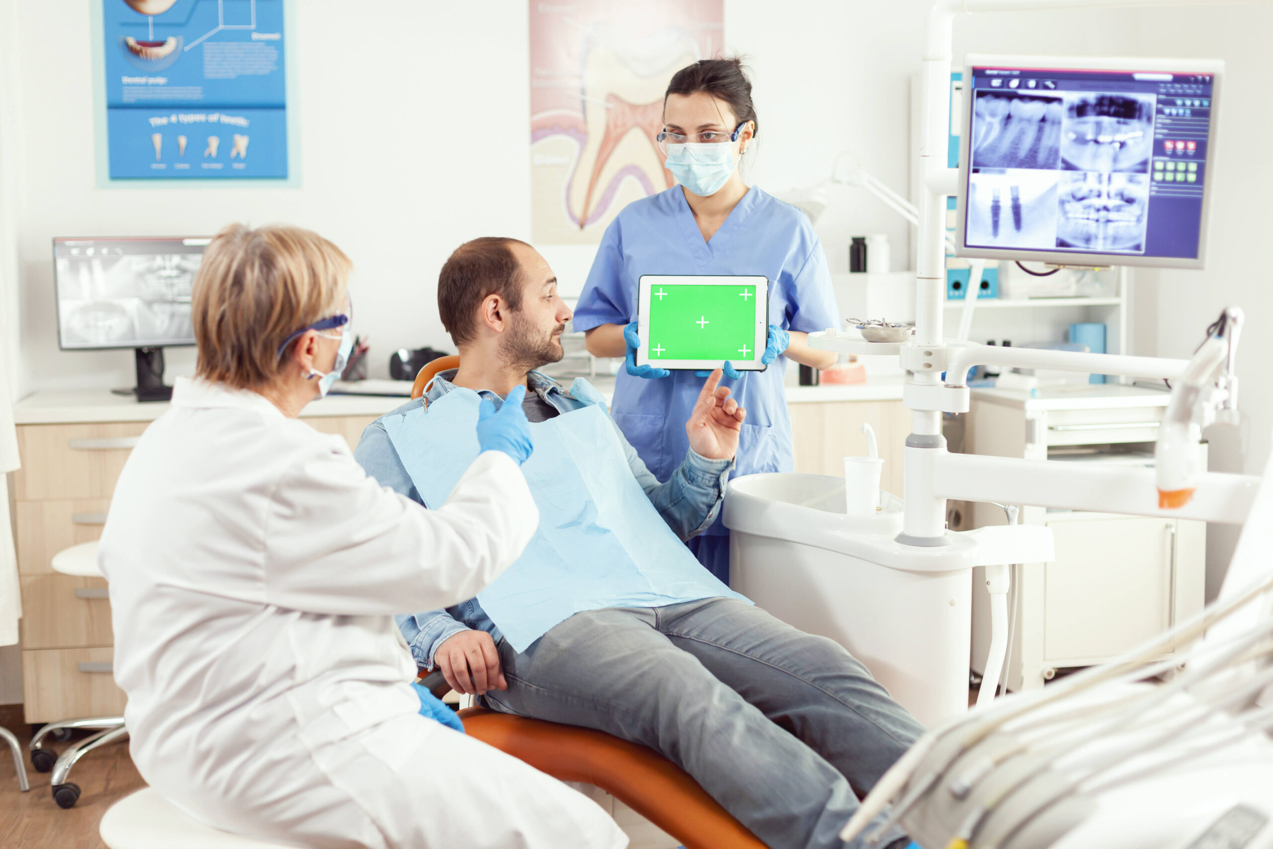 medical-nurse-holding-mock-up-green-screen-chroma-key-tablet-with-isolated-display-somatology-consultation (1)